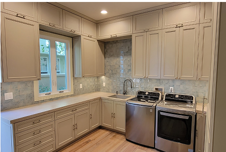 Luxury Laundry Room with Custom Cabinetry
